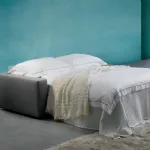 Divano letto due posti lineare in tessuto